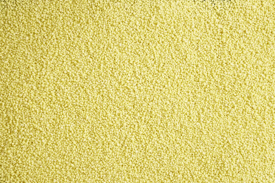 fresh yellow croup couscous close-up background screensaver
