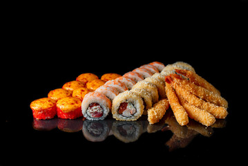 Sets of rolls on a black isolated background with reflection