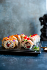 Sushi roll on black board