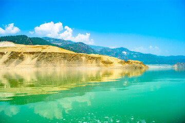 Fototapeta na wymiar Tehri lake in Uttarakhand, india, Tehri Lake is an artificial dam reservoir. Tehri Dam, the tallest dam in India and Tehri dam is Asia's largest man-made lake.