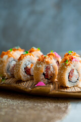 sushi roll on a metal plate