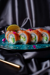 sushi rolls on the blue plate