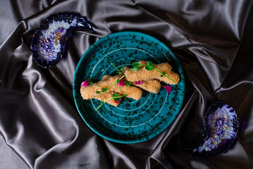 Fototapeta premium Cheese sticks with red sauce
