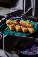 Cheese sticks with red sauce