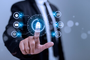 Fototapeta na wymiar Cybersecurity and privacy concepts to protect data. Lock icon and internet network security technology. Businessman protecting personal data on smart phone with virtual screen interfaces.