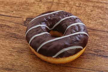 Glazed sweet tasty chocolate donut