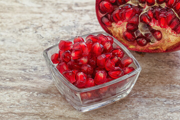 Ripe red Pomegranate seeds in the bowl