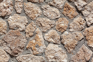 Stones and cement . Stoney background and texture . Stone wall background