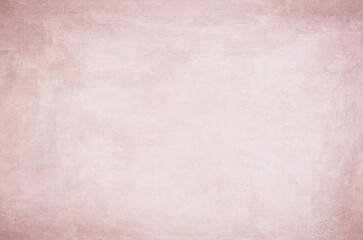 Pastel pink concrete texture for background in wallpaper. Stylish abstract wall design in cement and mortar.