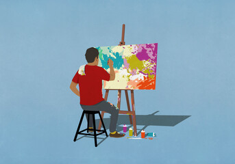 Man painting at easel and canvas
