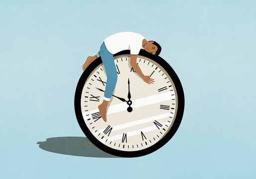 Man sleeping on top of clock
