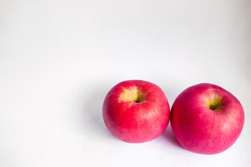 Two Red Fuji Apples from the Top View in White Isolated Background