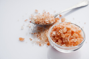 pink Himalayan salt on a white background