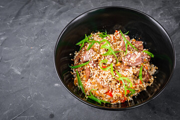 traditional chinese fried rice on black background