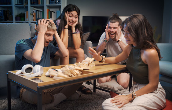 Happy People Playing Jenga Together