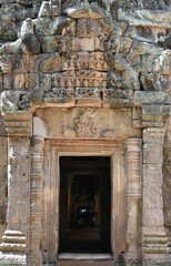 Fototapeta na wymiar Door Frame with Ornate Carvings, Ta Prohm, Siem Reap, Cambodia