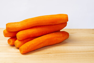 Peeled carrots on boards ready for cooking