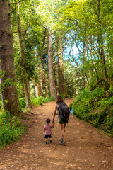 A mother with her son on the footpath at Levada do Caldeirao Verde, Queimadas, Madeira