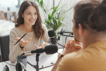 Young speaker conducting a podcast interview