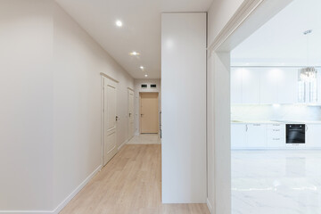 a large bright corridor in the new interior design of the house