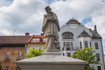 Fototapeta na wymiar Sculpture of John of Nepomuk in main square of historic part of Bielsko-Biala, Poland
