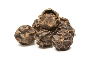 heap of black pepper, close-up macro photo. front view