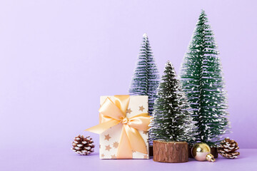 Christmas composition. craft Gift box, small tree, branches and craft DIY decorations on white background. New year concept. Christmas home decoration Flat lay, top view, copy space