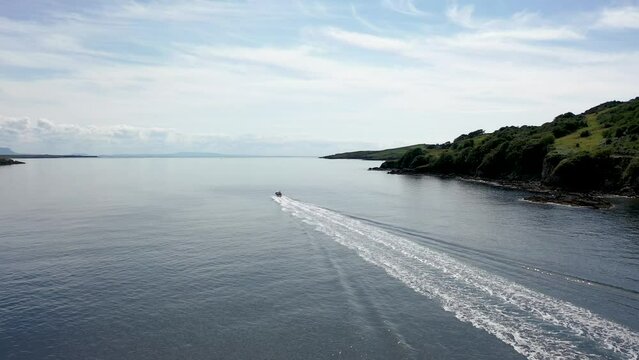 Fast boat leaving Killybegs harbour in County DOnegal, Ireland