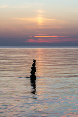 Sunset over the calm Baltic Sea, Tuja, Latvia. - obrazy, fototapety, plakaty