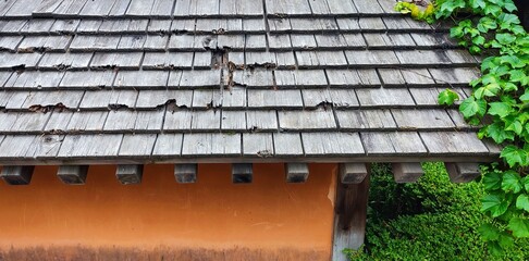 wooden roof of an ancient traditional japanese house. wooden roof tiles.