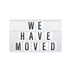 lightbox label with we have moved. Megaphone banner.