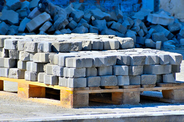 A pallet with a road stone on a summer day