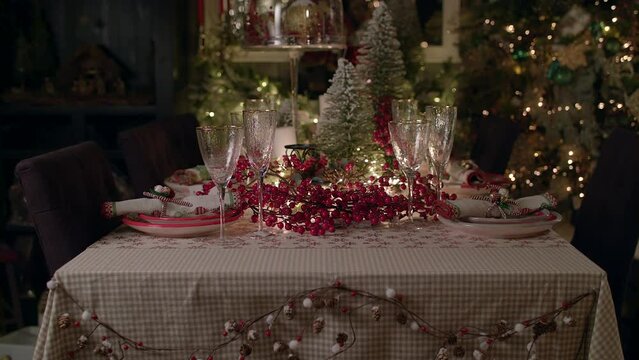 Stylishly set table for Christmas dinner for a large family