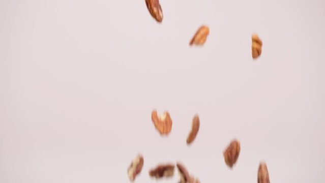 Pecans Falling In Slow Motion