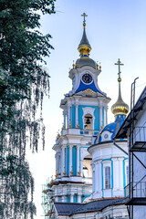Kostroma Church of the Savior in rows among the trees. Orthodox church in the old shopping malls in...