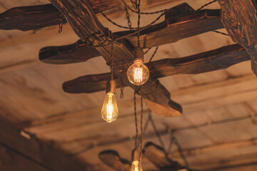 modern loft decorative lamps hanging from the ceiling Wooden interior design.