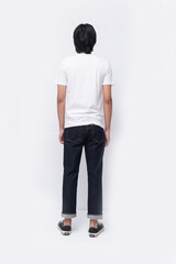 Full body portrait of a rear view young man in a white t-shirt. jeans , casual fashion.