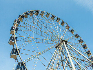 Part of the design of the Ferris wheel with booths.
