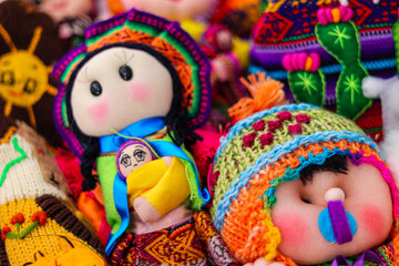 Fototapeta na wymiar Ethnic multicolored handmade rag dolls