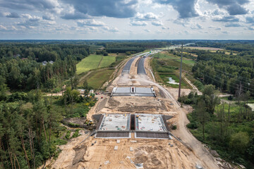 Drone view of construction site of express road S7 in Ruda village near Tarczyn city, Poland