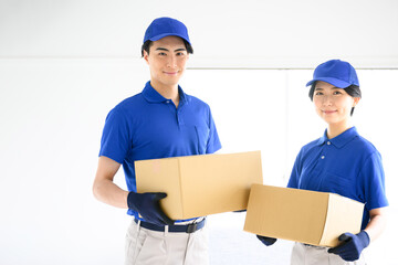 Image of staff carrying cooperatively in a move