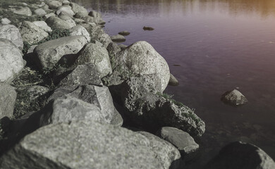 Fototapeta na wymiar stones by the water