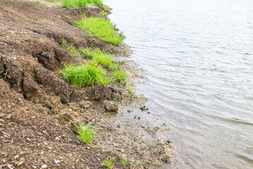 conceptual image water erosion along the river bank