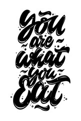 You are what you eat. Motivational and inspirational vector hand drawn phrase. Hand lettering
