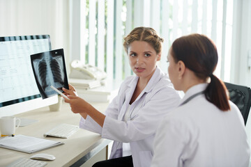Doctor Showing Lungs X-ray to Patient