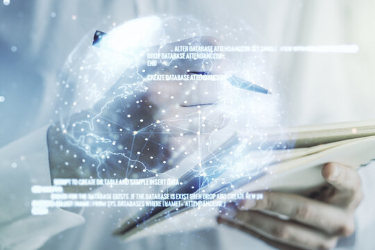 Multi exposure of abstract programming language hologram with world map and man hand writing in notepad on background, artificial intelligence and neural networks concept