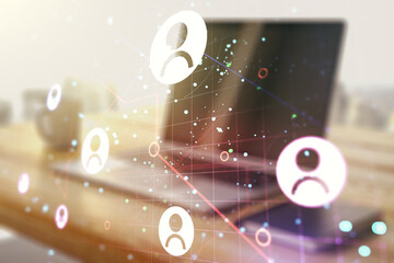 Double exposure of social network icons concept and modern desk with computer on background. Networking concept