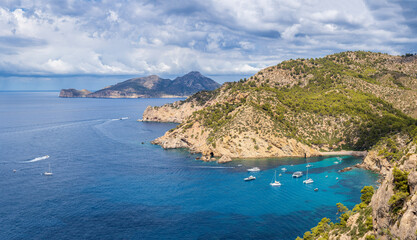 Naklejka premium pleasure boats anchored in Cala d´Egos, Andratx coast, Majorca, Balearic Islands, Spain
