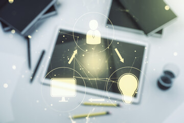 Double exposure of social network icons concept and modern digital tablet on background. Networking concept