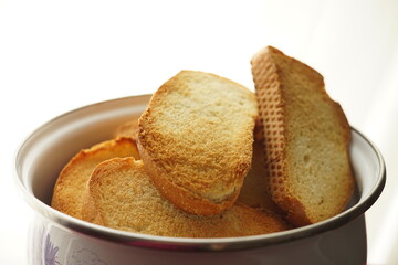 Fresh baked sandwich, pieces of crispy bread in a pan
